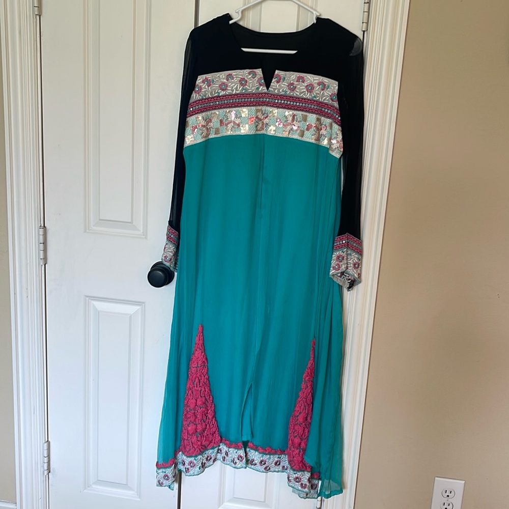 Pakistani Indian embroidered kurta. The material is chiffon.